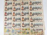six old comic books are stacked on top of each other