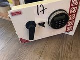 a safe box that has a digital clock inside of it