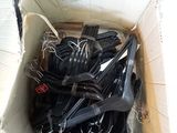 a cardboard box full of forks and spoons in it