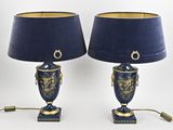 pair of blue and gold urn lamps with blue shades