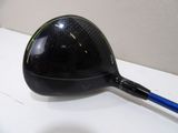 a black golf club with a blue handle on a white table