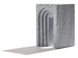 a stone bookend that is shaped like a door