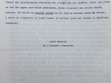 an old document with a black and white image of a man