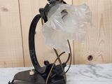 a lamp that is sitting on a marble table