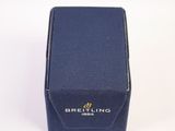 an image of a small blue box with a logo on it