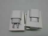 two plugs that are plugged into a white box