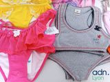 a lot of underwear that are on a bed