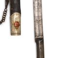 an image of a knife with a chain attached to it