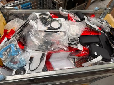 a metal container filled with assorted items in a store