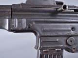 a close up of a machine gun on a table