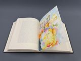 un livre ouvert avec l'image d'un lion dessus