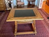 a wooden table with a glass top in the middle of a living room
