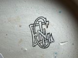 a close up of a plate with a design on it