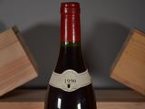a bottle of wine that is sitting on a table