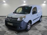 a picture of a white van parked on a checkered floor