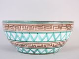 a blue and white bowl sitting on a table