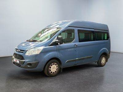 an image of a blue van parked in a room