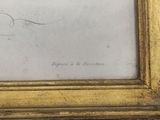 an old picture of a gold frame with a drawing on it