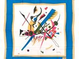 une photo d'une écharpe bleue et jaune ornée d'une peinture