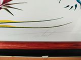 a picture of a picture of a bird of paradise on the wall