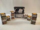 several boxes of food sitting on top of a table next to each other