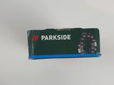 a close up of a box of parkside toothbrushes on a white surface
