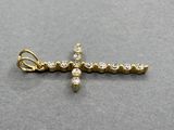 Pendentif croix en or jaune 14 carats serti de diamants