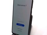 the back of a phone with a sign on it that says bienvenue