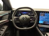 the interior of a car with a steering wheel, dashboard, and display screen