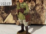 a figurine of a man in a military uniform