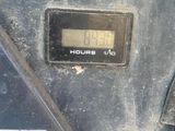 a close up of a clock on the side of a vehicle