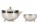 a silver tea pot and a silver bowl on a white background