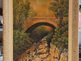 an oil painting of a bridge over a river with rocks and trees