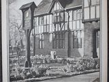 a black and white picture of a building with a clock on it