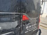 a black van parked on the side of the street