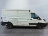 a white van that is parked in a parking lot