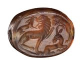 an image of a stone seal with a lion on it