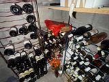 many bottles of wine on the shelves in the room