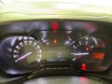 a close up of a car dashboard with a speedometer