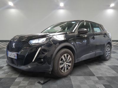 a picture of a black car parked in a showroom