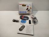 a box with a remote control and other items on the table