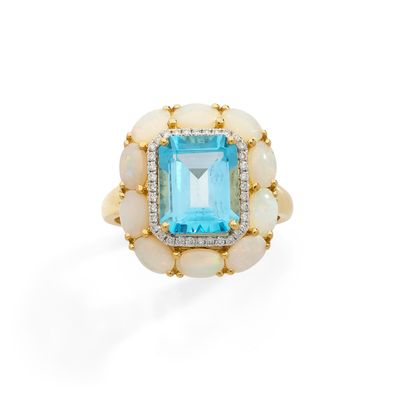 BAGUE ornée d'une topaze bleue de 4 carats environ dans un d…
