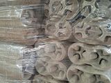 many rolls of toilet paper on the shelves in the store