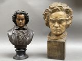 two busts of busts of a man and a bust of a woman