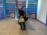 a motorcycle that is parked in a showroom
