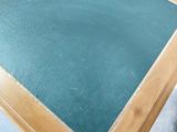 a table with a blackboard on top of it