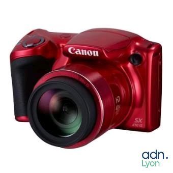 the canon sx1 is a compact digital camera with a wide angle lens