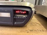 a close up view of a conveyor belt on a conveyor belt