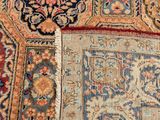 a close up of a rug with many different colors and patterns