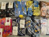 many pairs of men ' s socks in a plastic bag